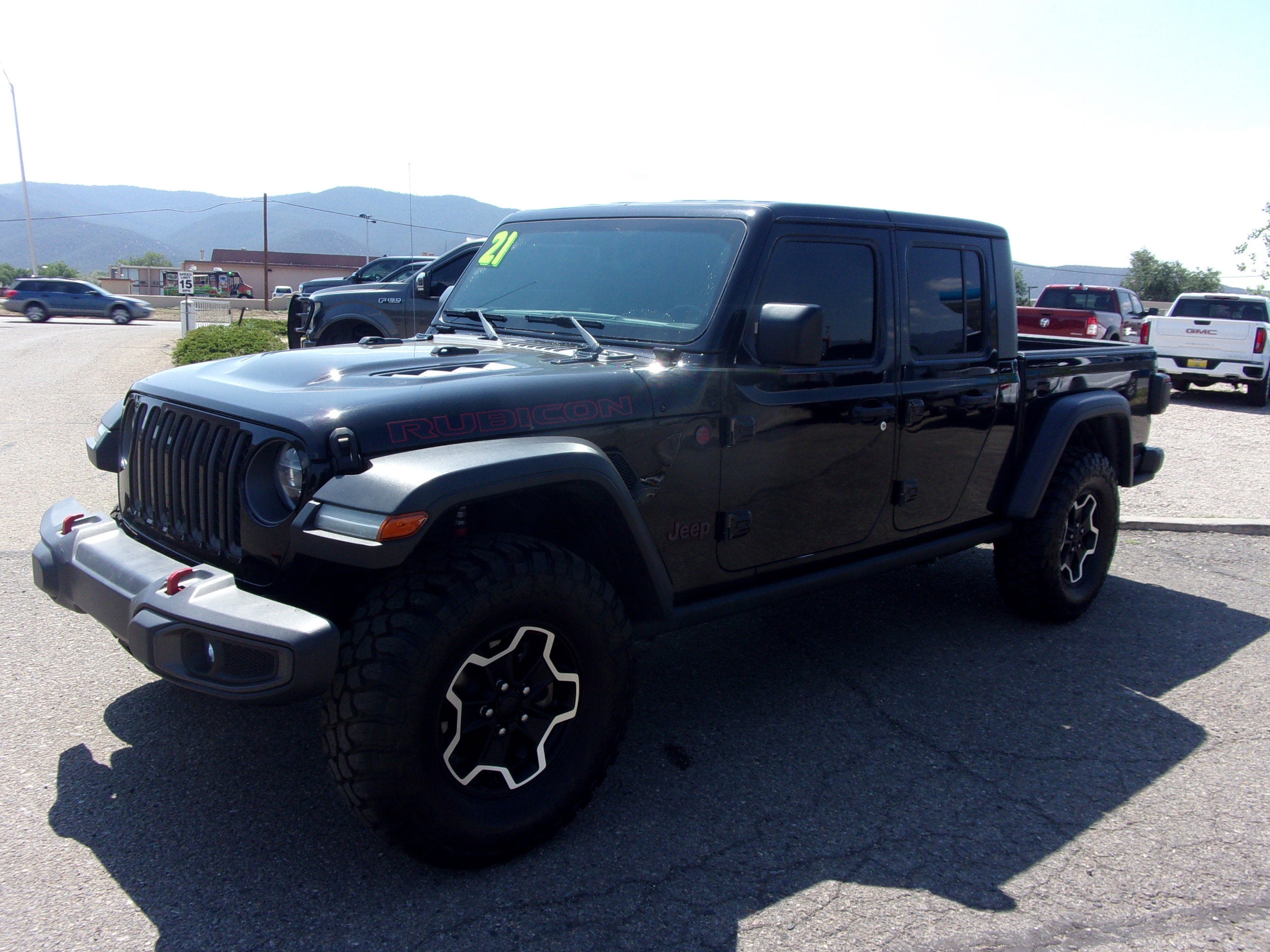 2021 Jeep Gladiator Rubicon in Black — front three-quarter view