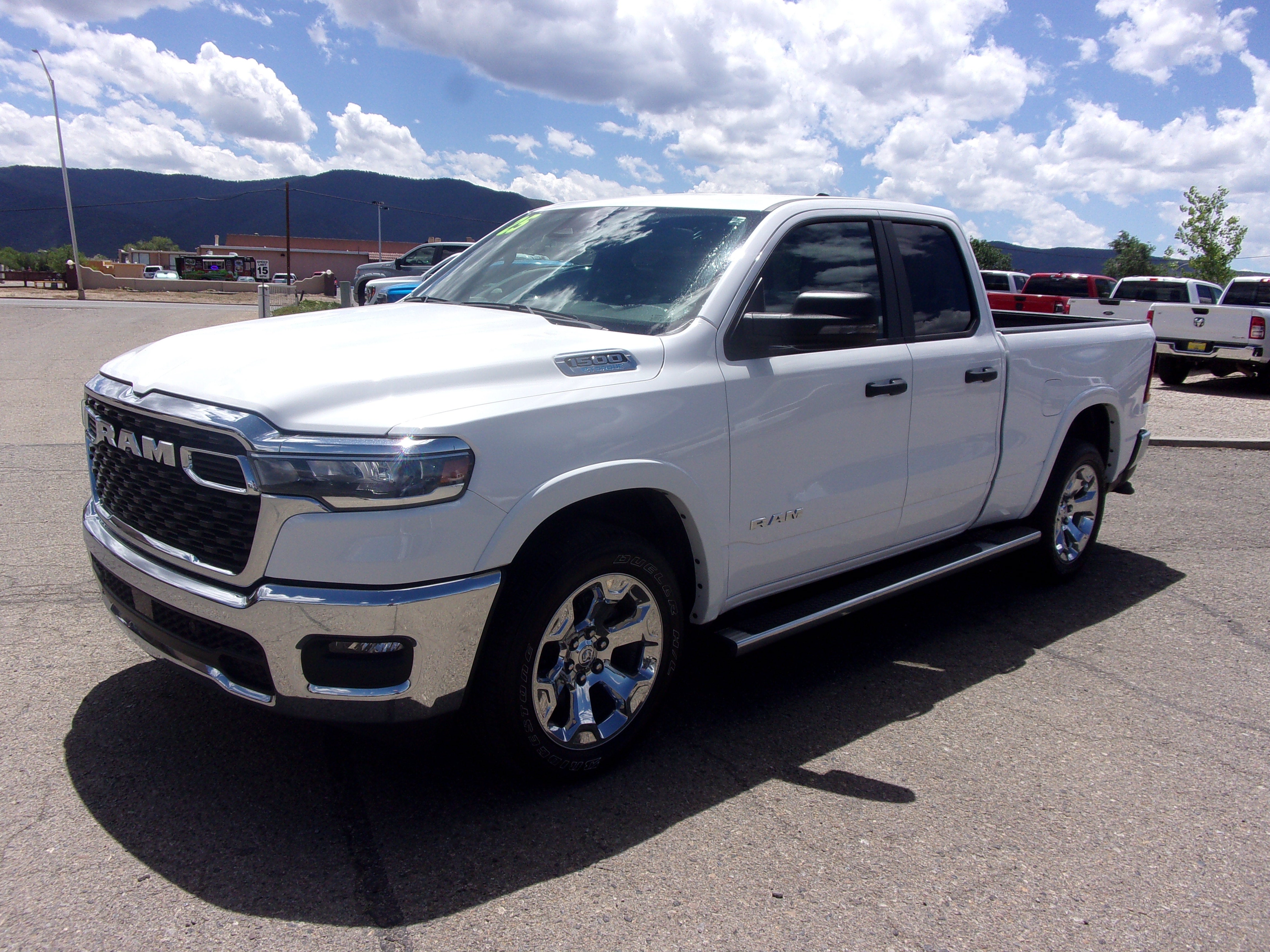 2025 RAM 1500 Big Horn in White — front three-quarter view