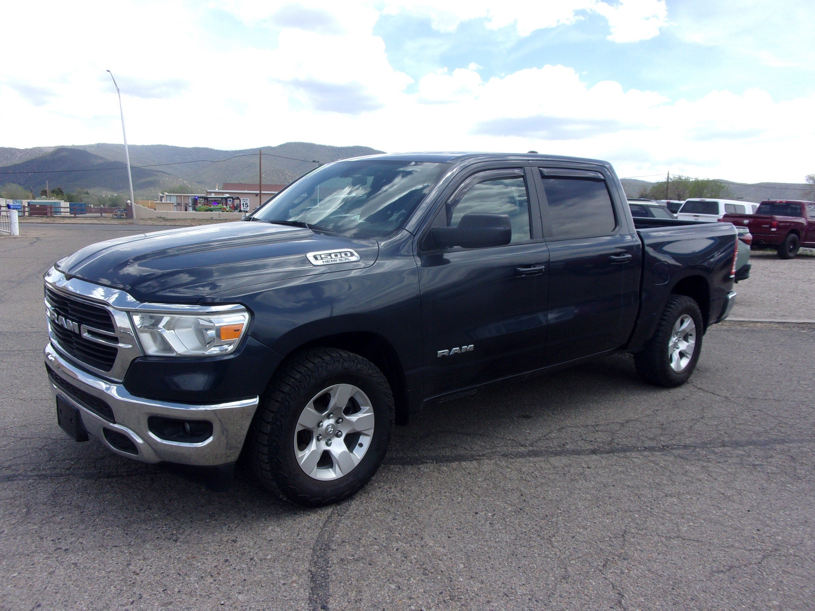 2021 RAM 1500 Big Horn in Gray — front three-quarter view