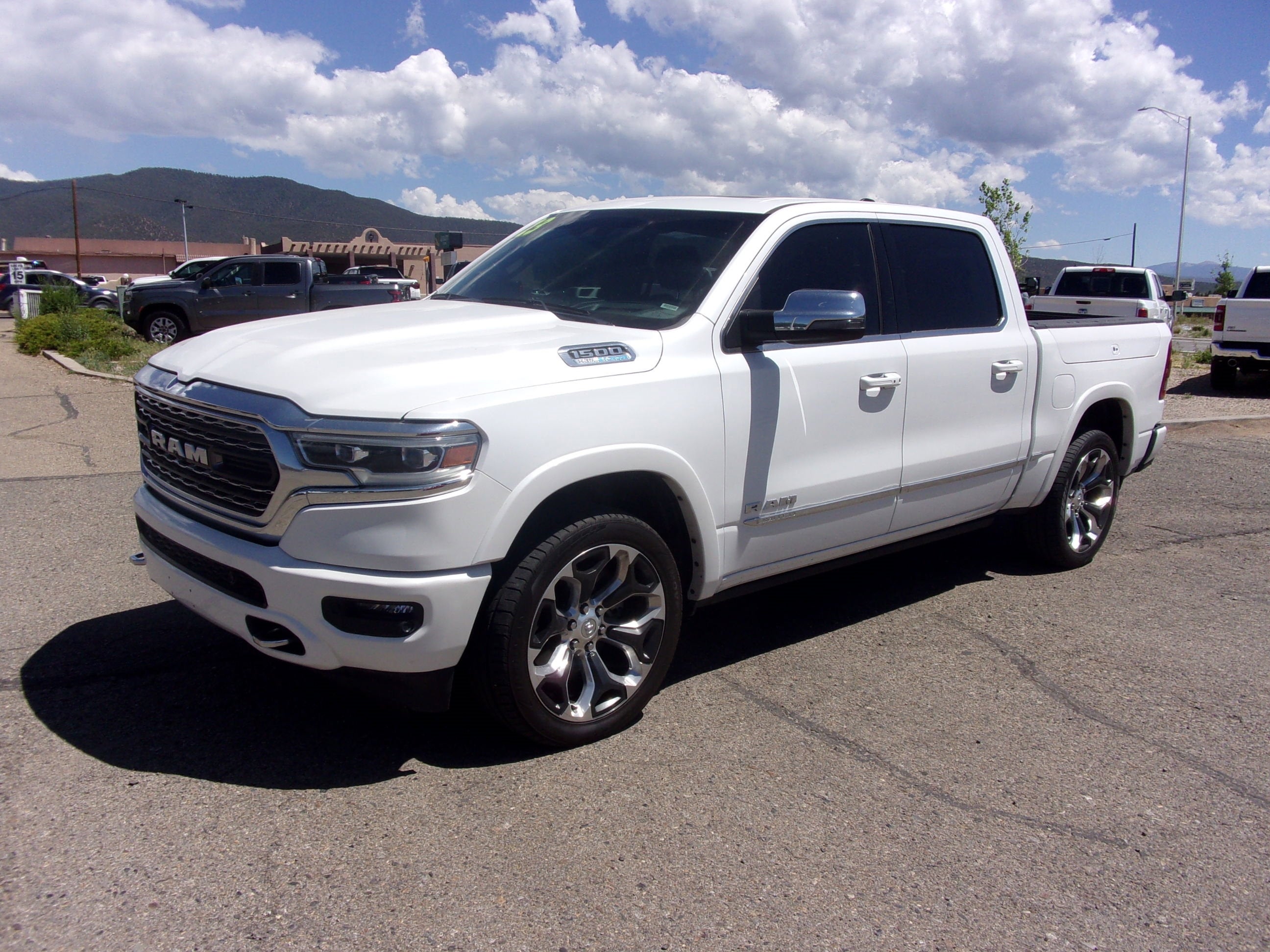 2023 RAM 1500 Limited in White — front three-quarter view