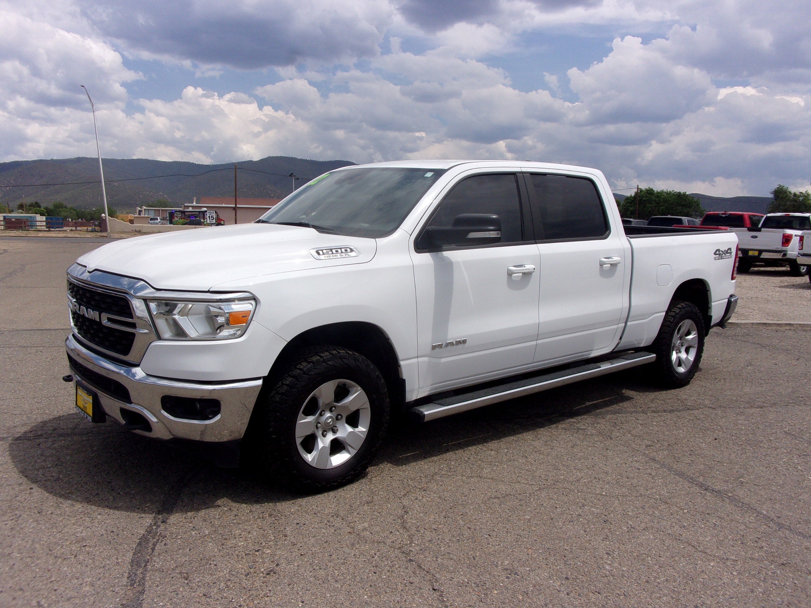 2022 RAM 1500 Big Horn in White — front three-quarter view
