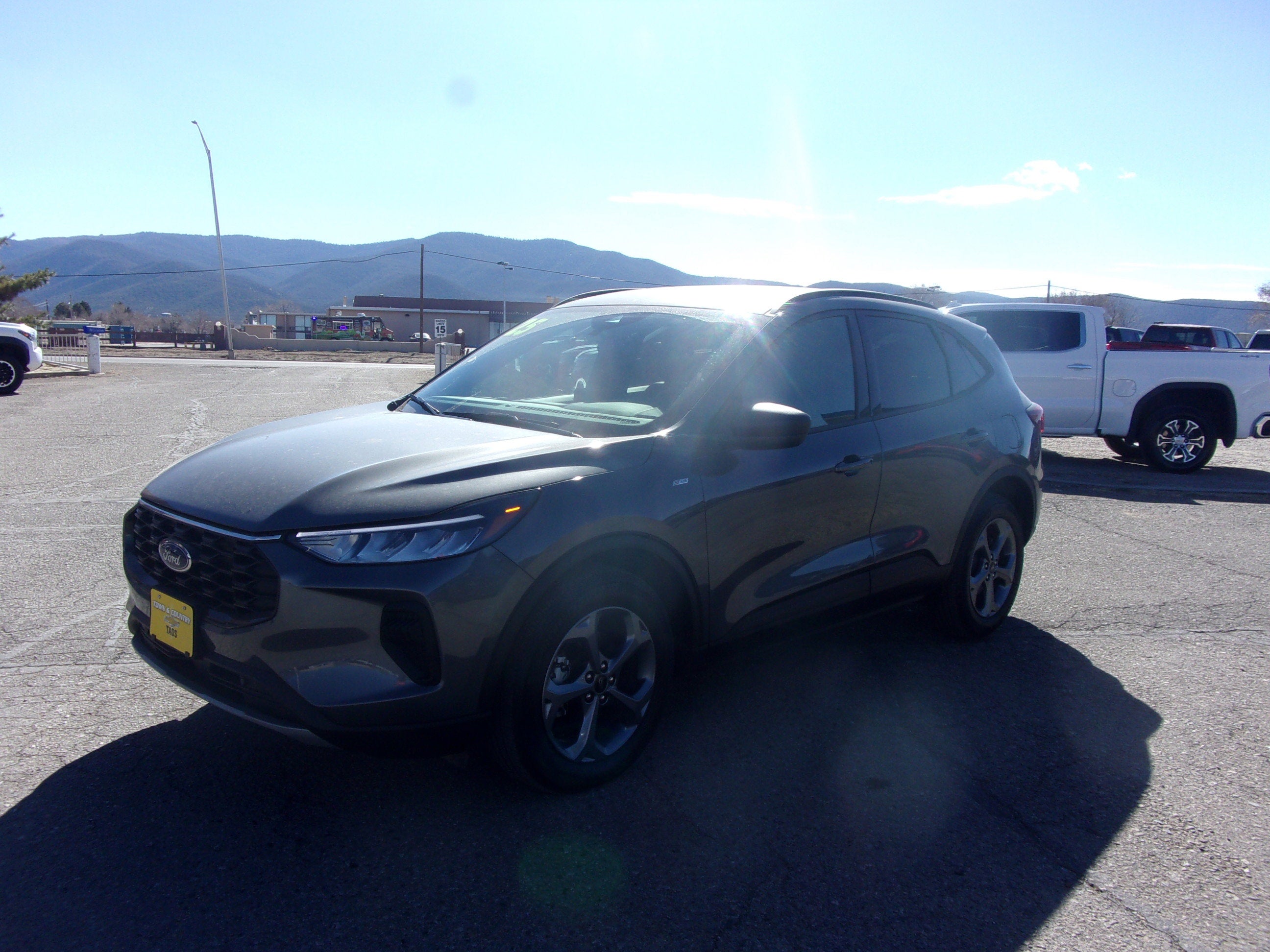 2025 Ford Escape ST-Line in Gray — front three-quarter view