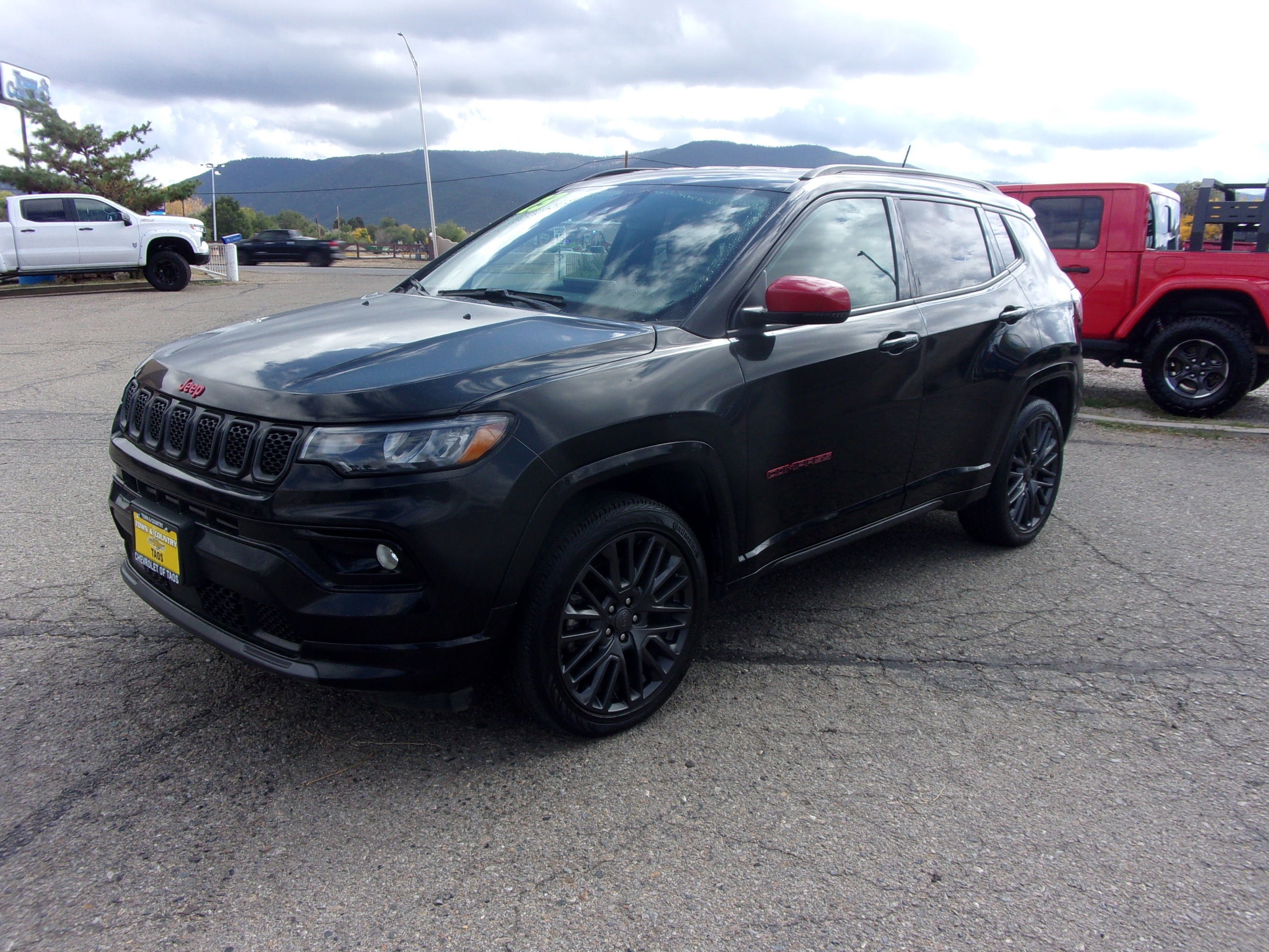 2023 Jeep Compass (RED) Edition in Red — front three-quarter view