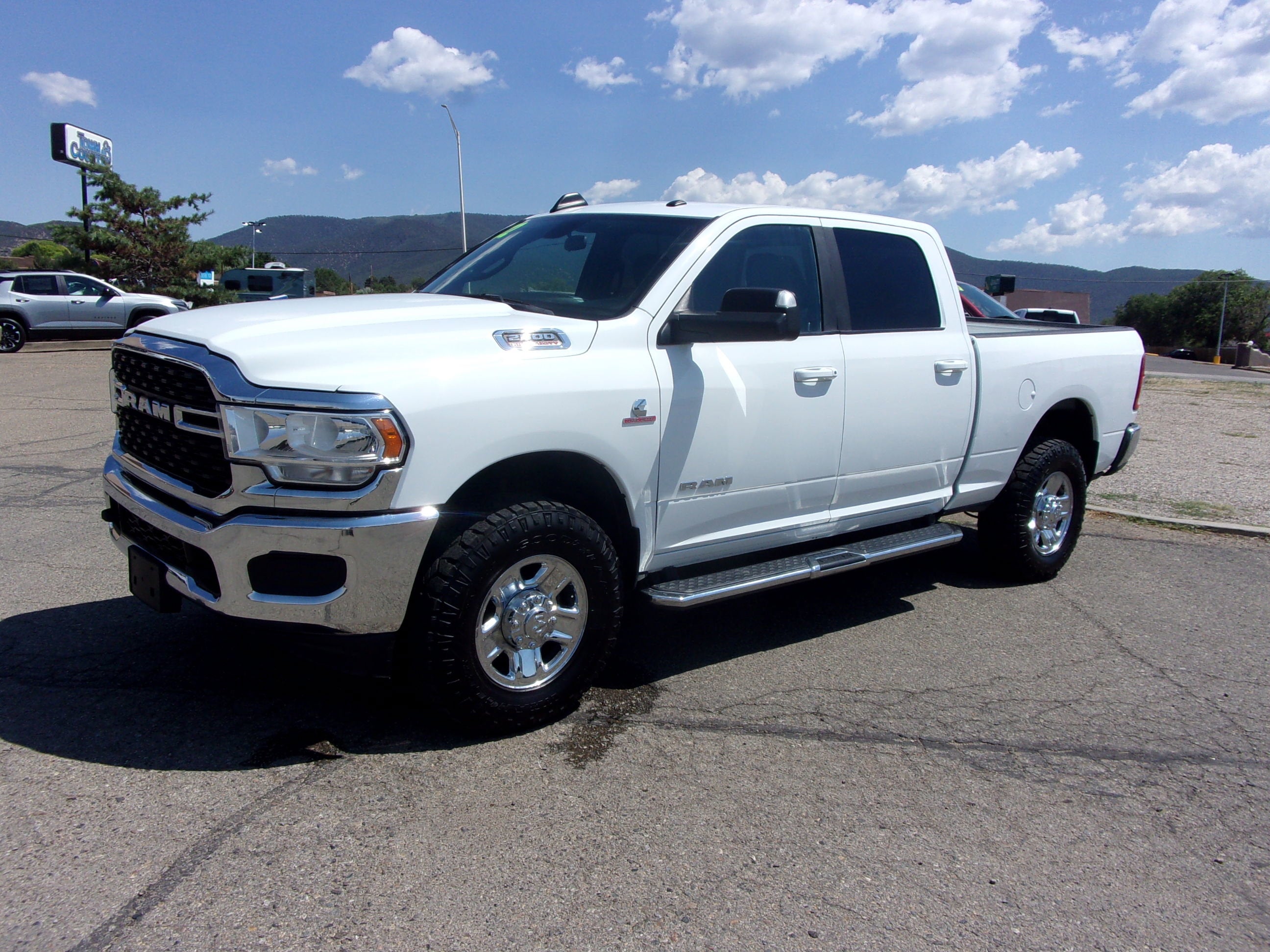 2022 RAM 2500 Big Horn in White — front three-quarter view