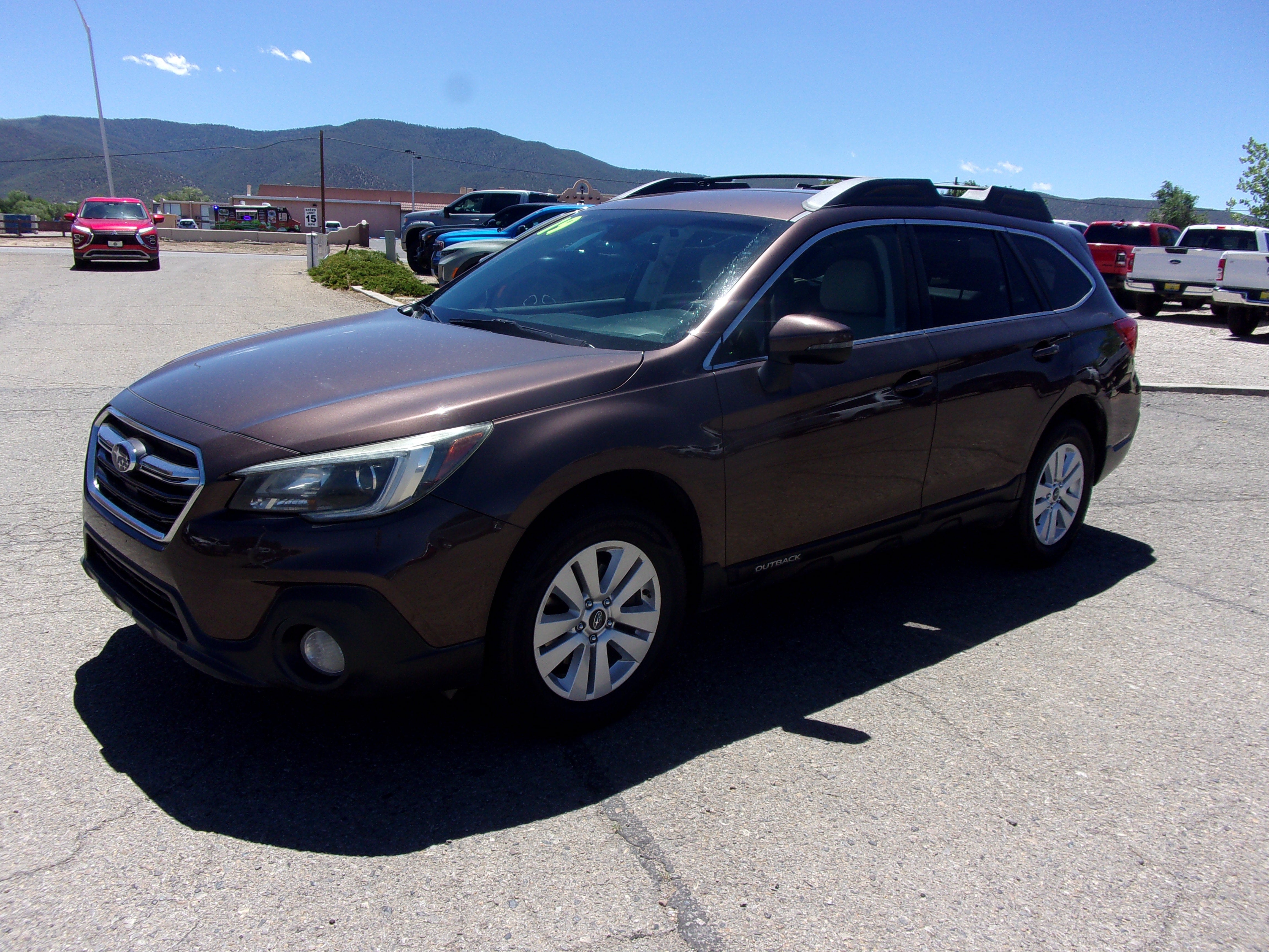2019 Subaru Outback Premium in Brown — front three-quarter view