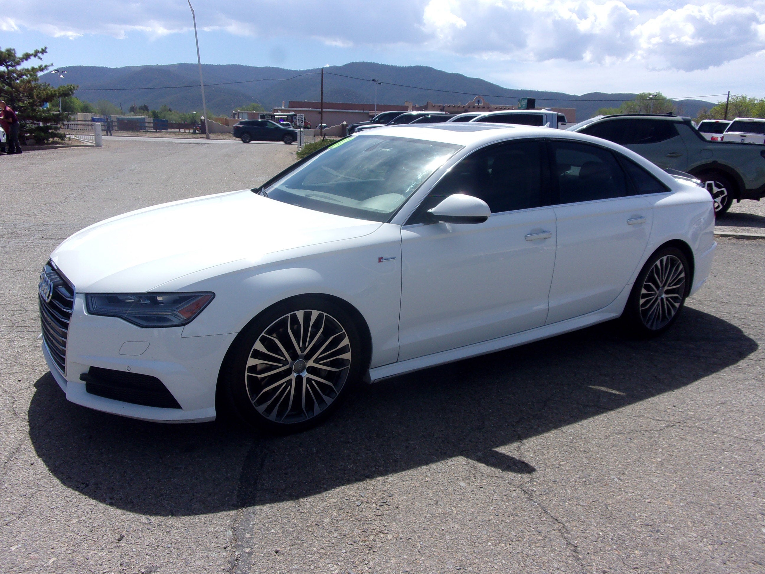 2018 Audi A6 Premium Plus in White — front three-quarter view